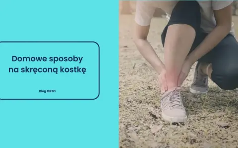 Osoba trzymająca się za czerwoną, bolącą kostkę w butach sportowych.